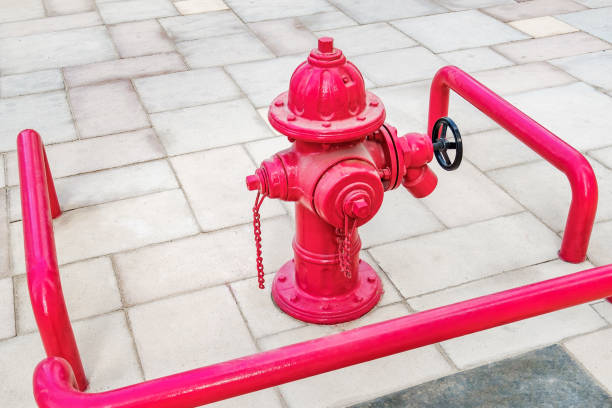 istock red fire hydrant faucet on street 2187007105
