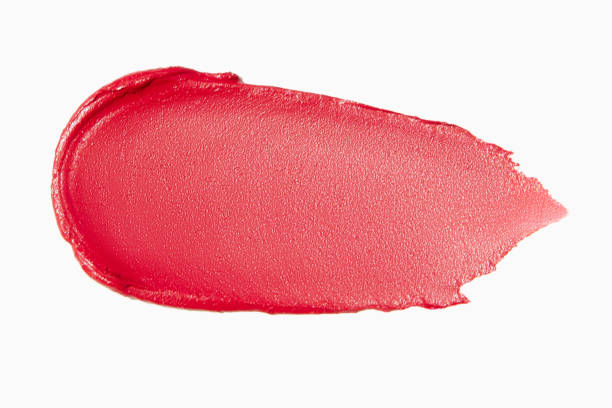 istock Matte red lipstick smear on a light white background. Cosmetic texture. 2187007600