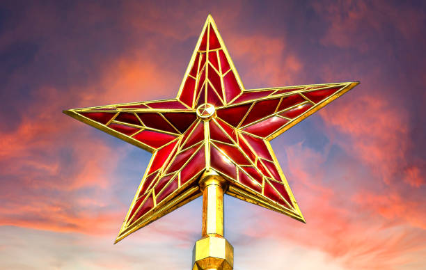 istock Red ruby star of Moscow Kremlin tower against the crimson sky 2187008492