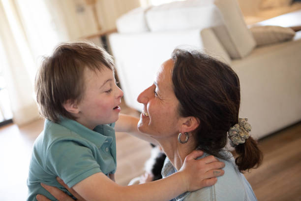 istock Mother and son hugging and kissing 2187013148