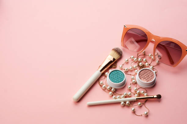 istock eyeshadow accessories beads makeup brushes collection professional cosmetics on pink background 2187015370