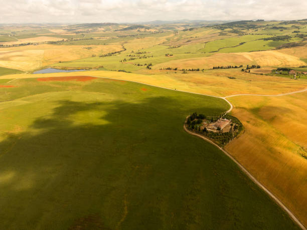 istock Rolling Hills and Lush Fields in Tuscany Aerial View 2187016482