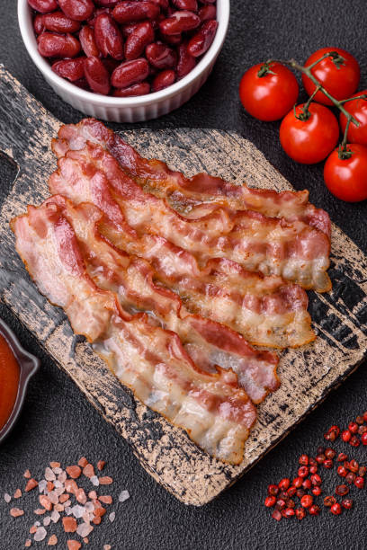 istock Bacon sliced, grilled with salt and spices 2187016520