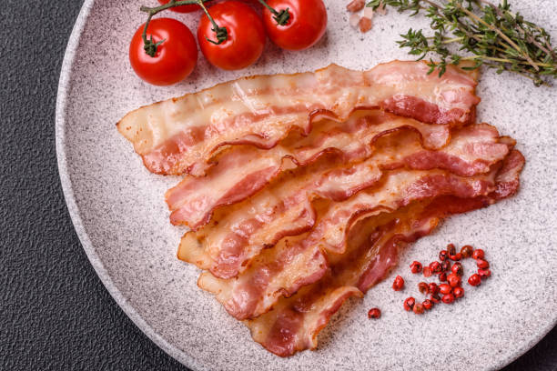 istock Bacon sliced, grilled with salt and spices 2187016548