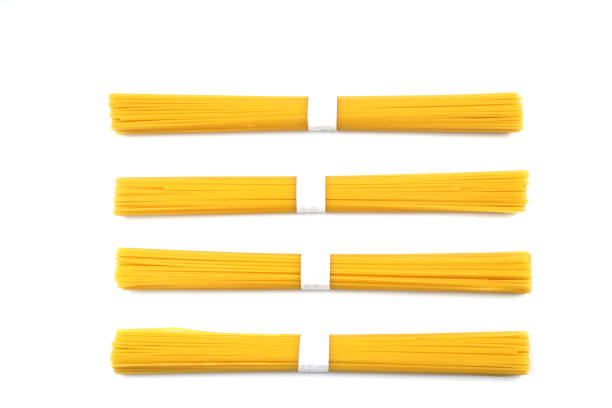 istock pile of spaghetti on white background, top view 2187021037