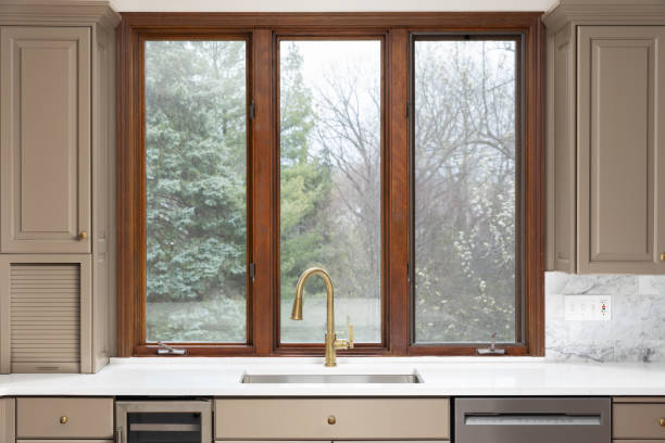 istock A brown kitchen with a gold faucet. 2187021632