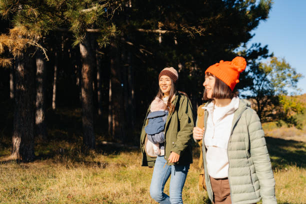 istock Friends walking together in nature 2187030865