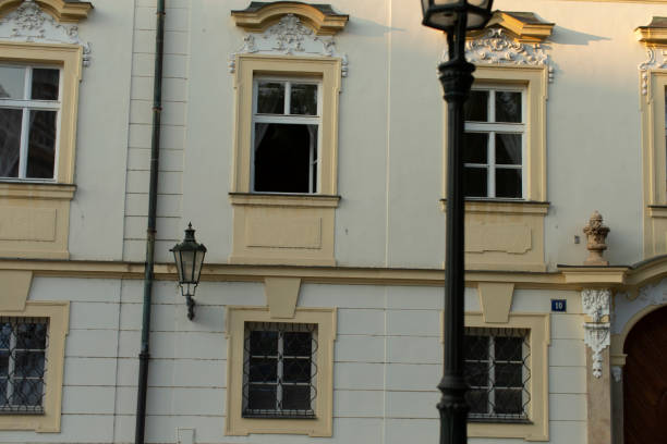 istock Building Facade with Windows and Street Lamp in Urban Setting 2187031458