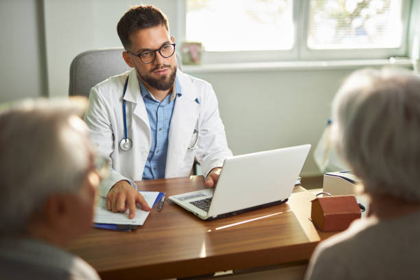 istock Male doctor having a consultation with an elderly patients 2187032487