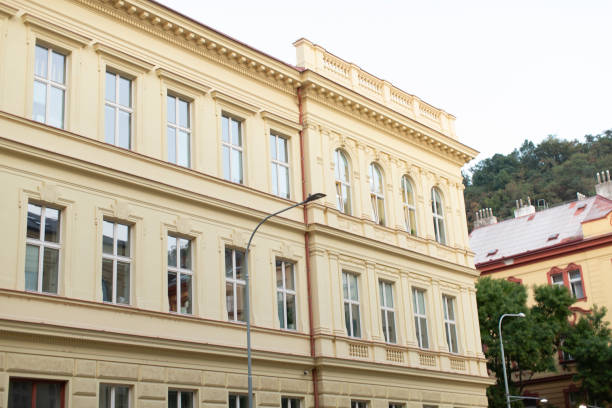 istock A Historic Building Facade Featuring Windows Set Against an Urban Background 2187035740