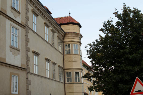 istock Historic Building Corner with Windows and Tower in Urban Background 2187035760