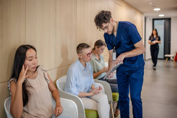 istock Medical staff interacting with seated patients 2187036448