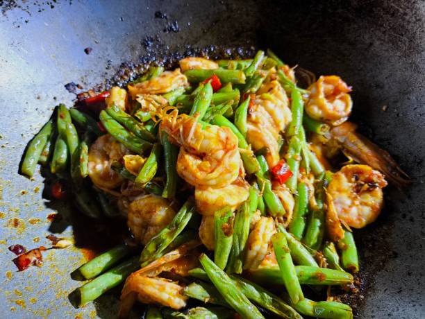 istock Frying shrimps with long beans  in pan 2187038777