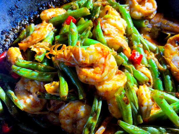 istock Frying shrimps with long beans  in pan 2187038779