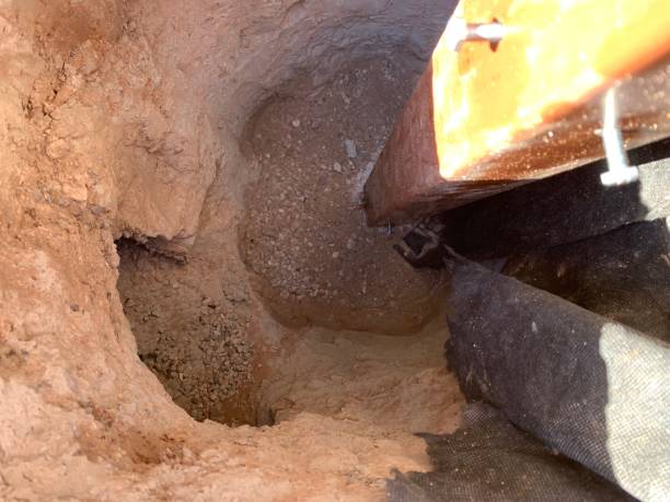 istock Excavation Site Showing Soil and Wood 2187042666