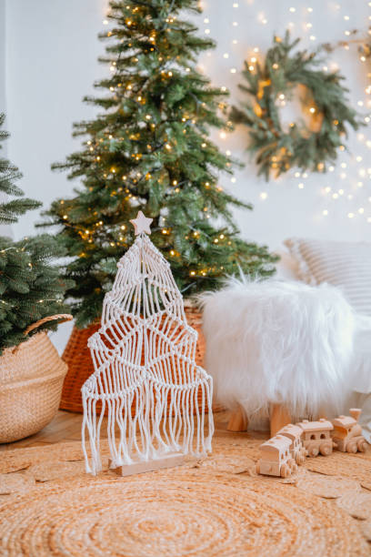istock Cozy holiday decorations with a handmade Christmas tree and festive atmosphere 2187045447