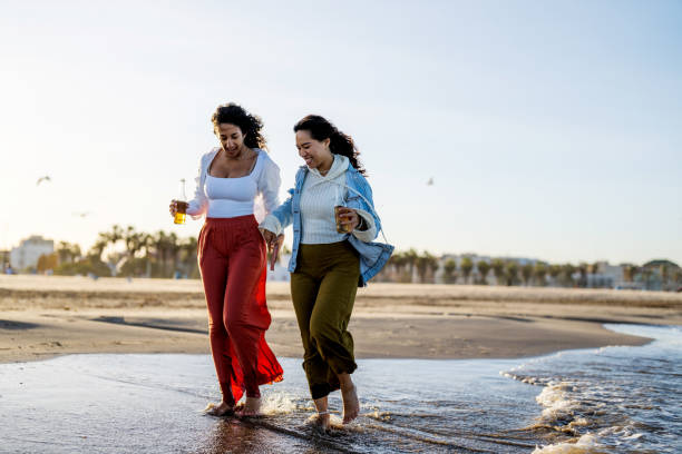istock Joyful Hispanic Friends at Seaside Retreat 2187047777