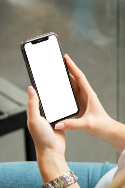 Close-up of Hands Holding Phone with White Screen – Template Mockup on White Background
