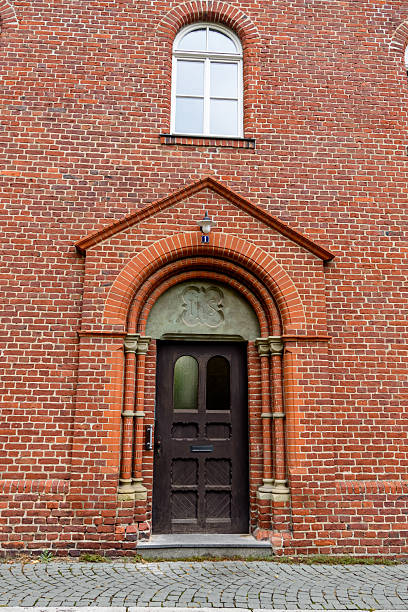 istock Door in an old red brick house in Germany 2187050769