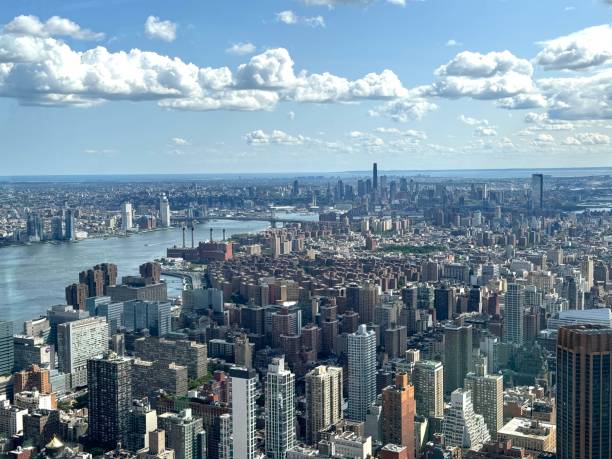 istock downtown manhattan new york skyline along east river and brooklyn bridge from skyscraper rooftop 2187054924