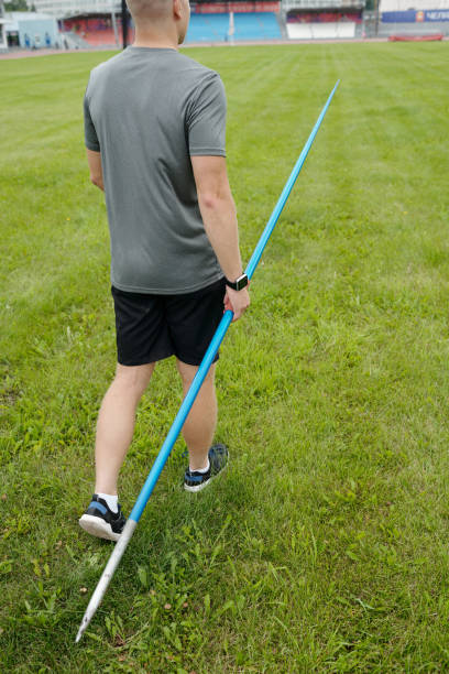 istock Holding Javelin While Preparing for Athletic Practice Outdoors 2187060816
