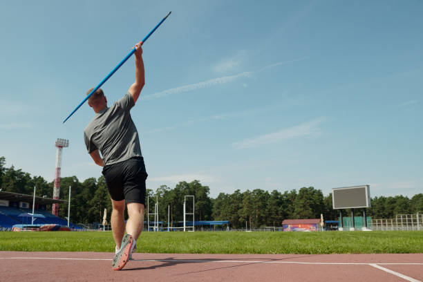 :biggrin:Javelin athlete is going to perform a javelin throw on an . stadium full of spectators.
