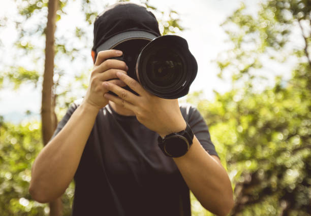 istock Photographer taking pictures in summer mountains 2187062913