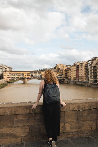 istock Contemplating the Ponte Vecchio in Florence 2187065827