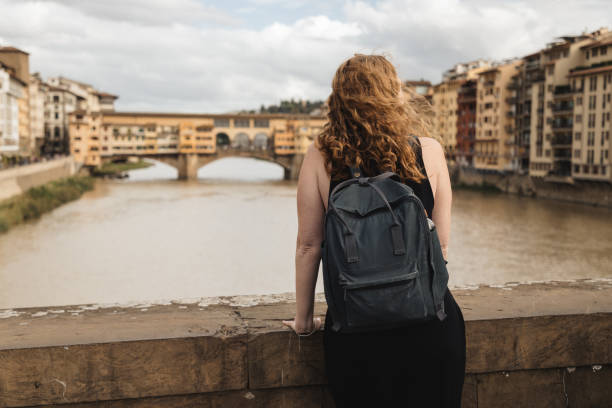 istock Contemplating the Ponte Vecchio in Florence 2187065834