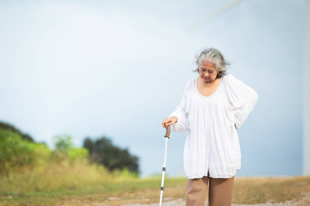 istock Asian elderly woman walking in nature. 2187066829