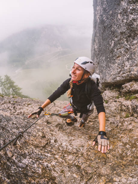 istock Female Mountain Climber on Rocky Terrain 2187071546