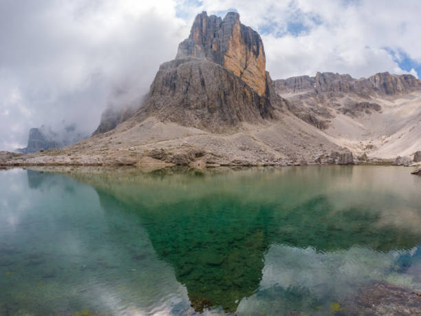 istock Emerald Lake in the Dolomites Surrounded by Rocky Peaks 2187073321