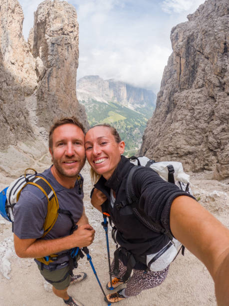 istock Cheerful Hikers Taking a Selfie on Rugged Mountain Trail with Alpine Views 2187073349
