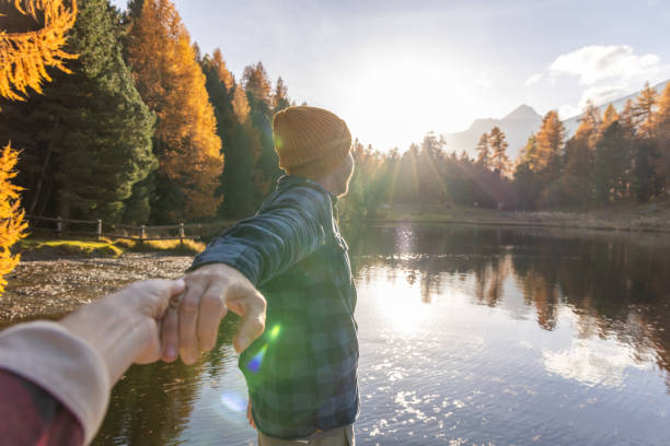 istock Couple Enjoying Scenic Autumn Lakeside 2187073810