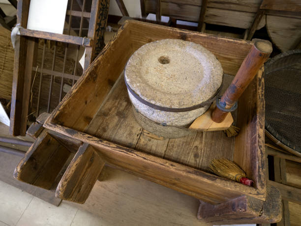 istock Old Japanese millstone and stand 2187078499