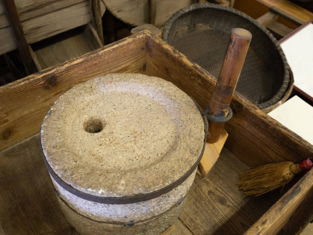 istock Old Japanese millstone and stand 2187078507