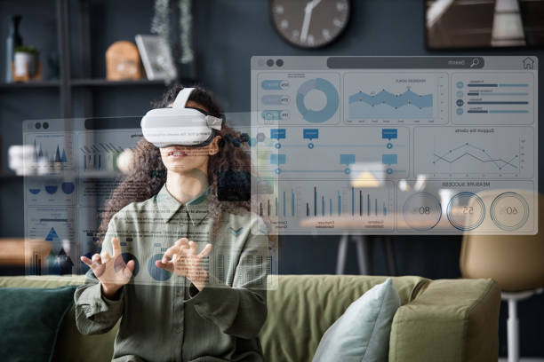 istock Woman In VR Headset Using App 2187081124