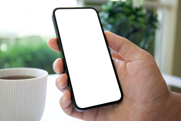 istock man hands hold phone with isolated screen on background cafe 2187081475
