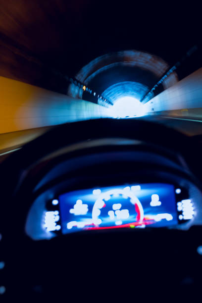 istock Driving fast inside a tunnel with a car driver point of view 2187082011