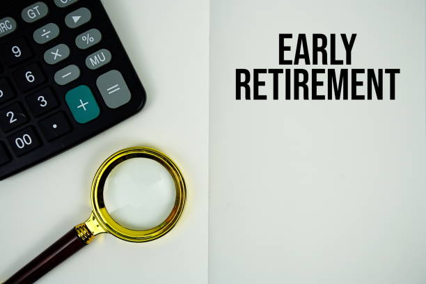 istock Early Retirement text message written on note page with magnifying glass and calculator 2187083830