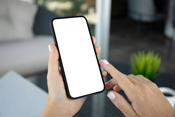 istock male hands holding phone with isolated screen background cafe office 2187083852
