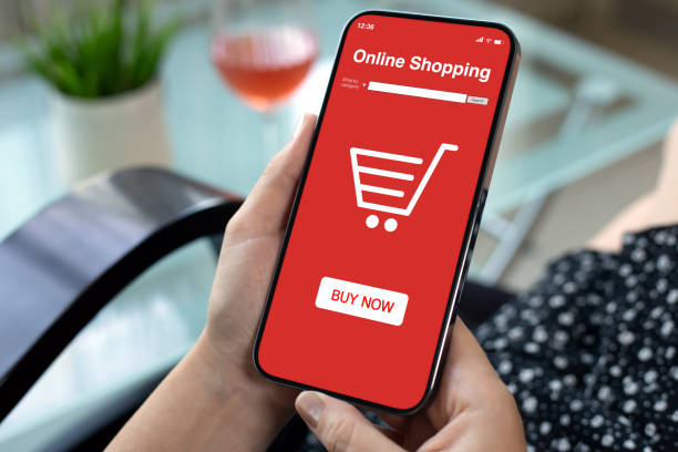 istock female hands holding phone with online shopping app on screen 2187084122