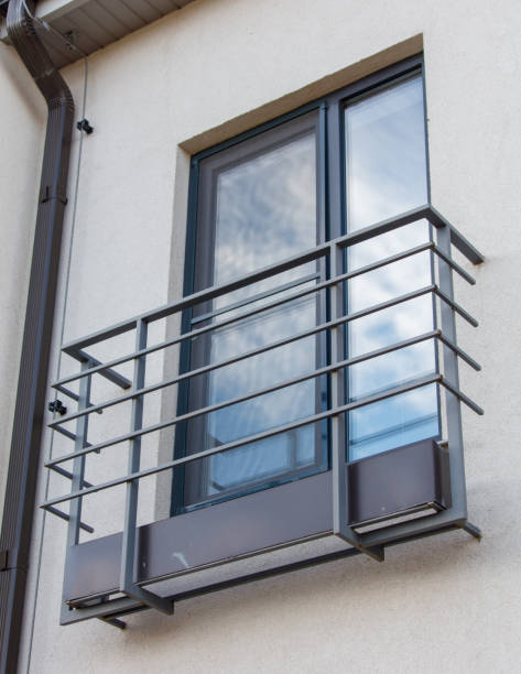 istock A window with a metal railing and a window box 2187084343