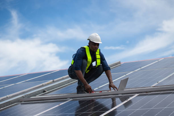 istock Service engineer checking solar cell on the roof for maintenance if there is a damaged part. Engineer worker install solar panel. Clean energy concept. 2187085988
