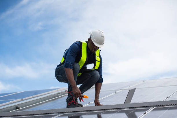 istock Service engineer checking solar cell on the roof for maintenance if there is a damaged part. Engineer worker install solar panel. Clean energy concept. 2187086009