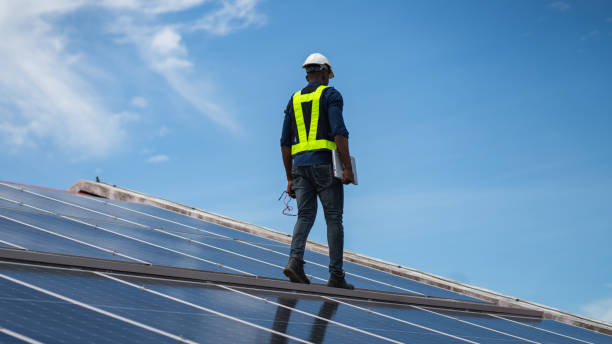 istock Service engineer checking solar cell on the roof for maintenance if there is a damaged part. Engineer worker install solar panel. Clean energy concept. 2187086073