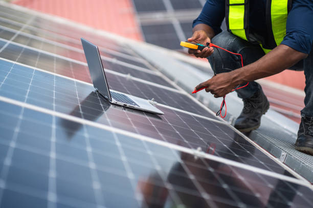 istock Service engineer checking solar cell on the roof for maintenance if there is a damaged part. Engineer worker install solar panel. Clean energy concept. 2187086085