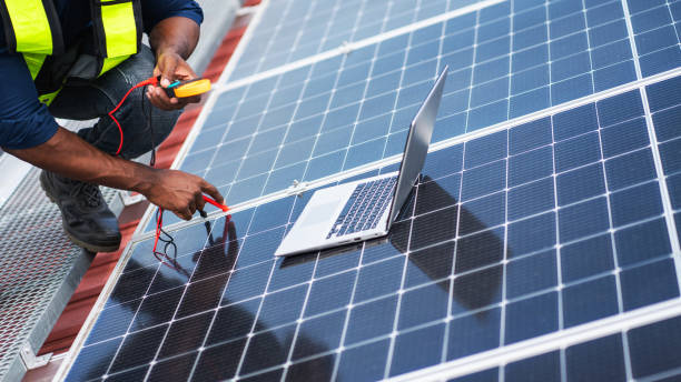 istock Service engineer checking solar cell on the roof for maintenance if there is a damaged part. Engineer worker install solar panel. Clean energy concept. 2187086137