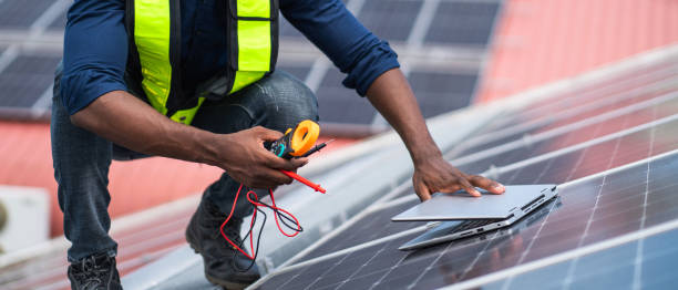 istock Service engineer checking solar cell on the roof for maintenance if there is a damaged part. Engineer worker install solar panel. Clean energy concept. 2187086141