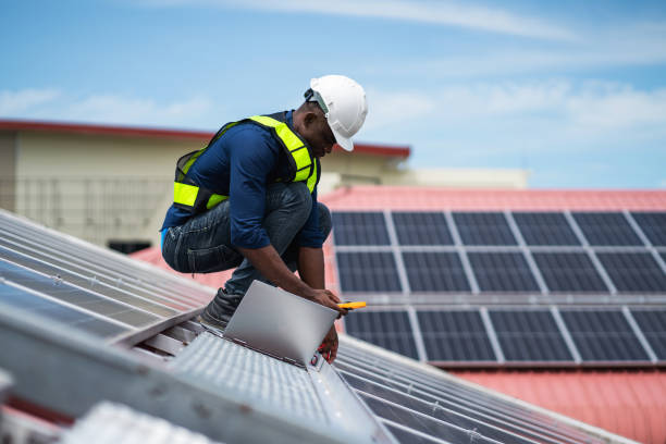 istock Service engineer checking solar cell on the roof for maintenance if there is a damaged part. Engineer worker install solar panel. Clean energy concept. 2187086187